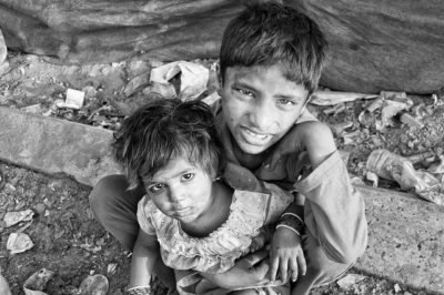Hungry Children Boy and Girl Sitting BW